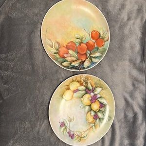 Hand painted and signed set of 3 porcelain plates